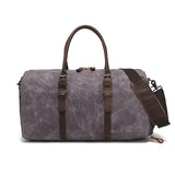 New wear-resistant oil wax canvas travel bag retro European and American solid color outdoor shoulder luggage bag storage bag wholesale