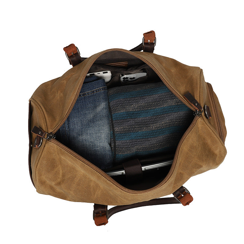 New wear-resistant oil wax canvas travel bag retro European and American solid color outdoor shoulder luggage bag storage bag wholesale